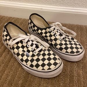 White and black checkered vans